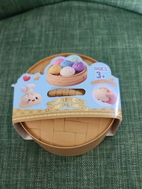 Squeezy Dumpling With Steamer Container Mystery Squeeze Toy